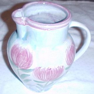 Handmade Flower Design Pottery Pitcher with Ying Yang Mark on The Side