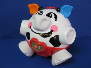 Fisher Price Bumble Ball Cow Vibrates Shakes Musical Developmental