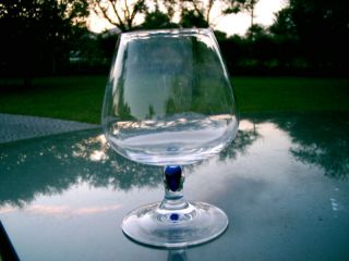 COURVOISIER BRANDY GLASS FANCY LOGO ON BASE BLUE STEM
