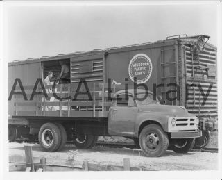 E28 Stake Truck & Railroad Boxcar, Factory Photo (Ref. #78344