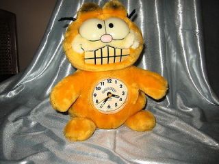 by Dakin Garfield with Clock in HIs Tummy and Eyes Glow at Night