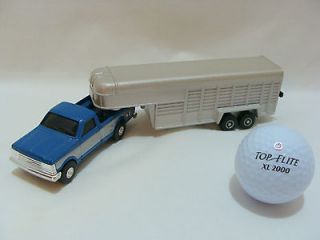 Silver & Blue Ford F 250 Pick Up Truck With Livestock Trailer
