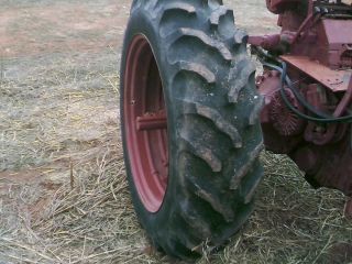 International Farmall 15 5 x 38 tires and rims in excellent shape read