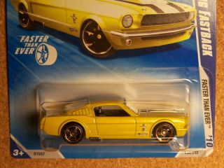 HW Ford Mustang Fastback in yellow w/ black tampo & FTE wheels 132/240