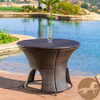 Christopher Knight Home Rodolfo Wicker Multibrown Outdoor Round Storage Table (MultibrownFeatures a double sided top that opens from both sidesIdeal for storing a variety of outdoor itemsSome assembly requiredDimensions: 24.50 inches high x 32.75 inches w